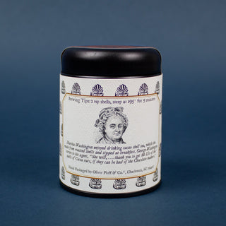 back image of small black tin that holds cacao. 2 tsp shells, steep at 195 degrees for 5 minutes.