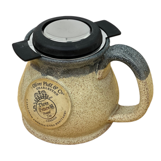 brewing basket with lid on sitting inside oliver pluff 12 oz mug