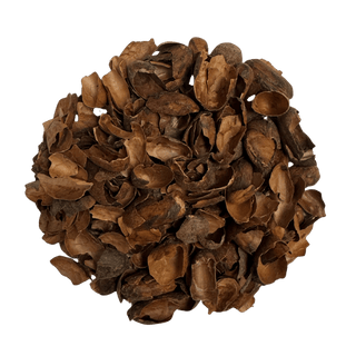 roasted cacao shell loose tea on white background