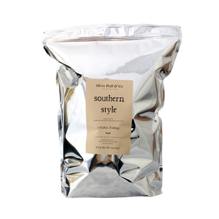 Silver coffee bag with a label on a white background